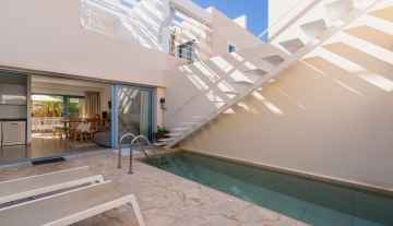 Resa Estates Ibiza sale ted koop Cala Tarida patio townhouse pool area.JPG